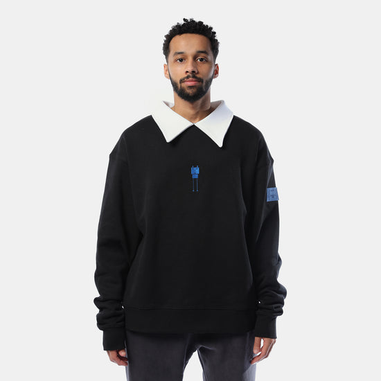 White collar black sweater